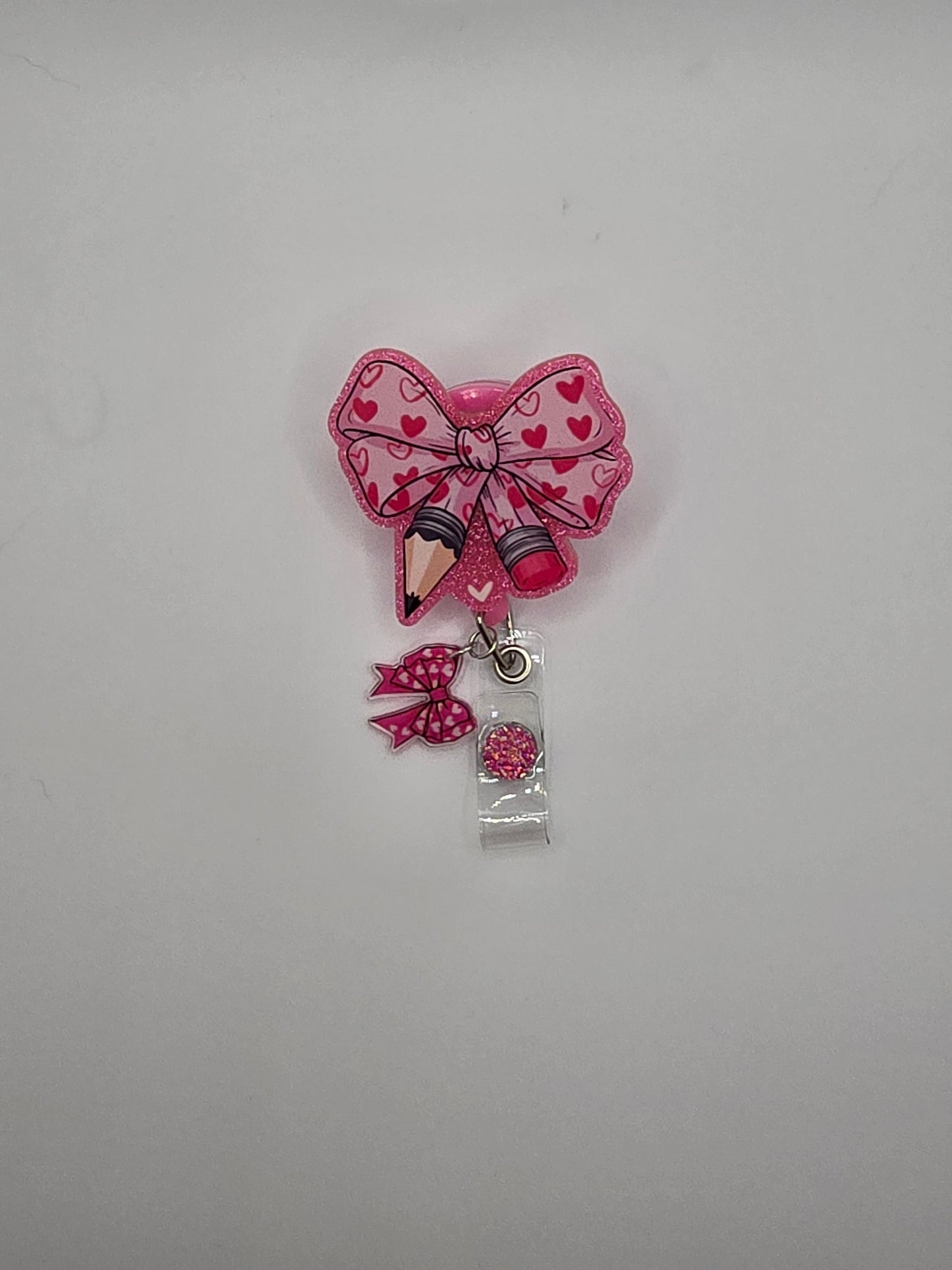 Pencil Bow Badge Reel