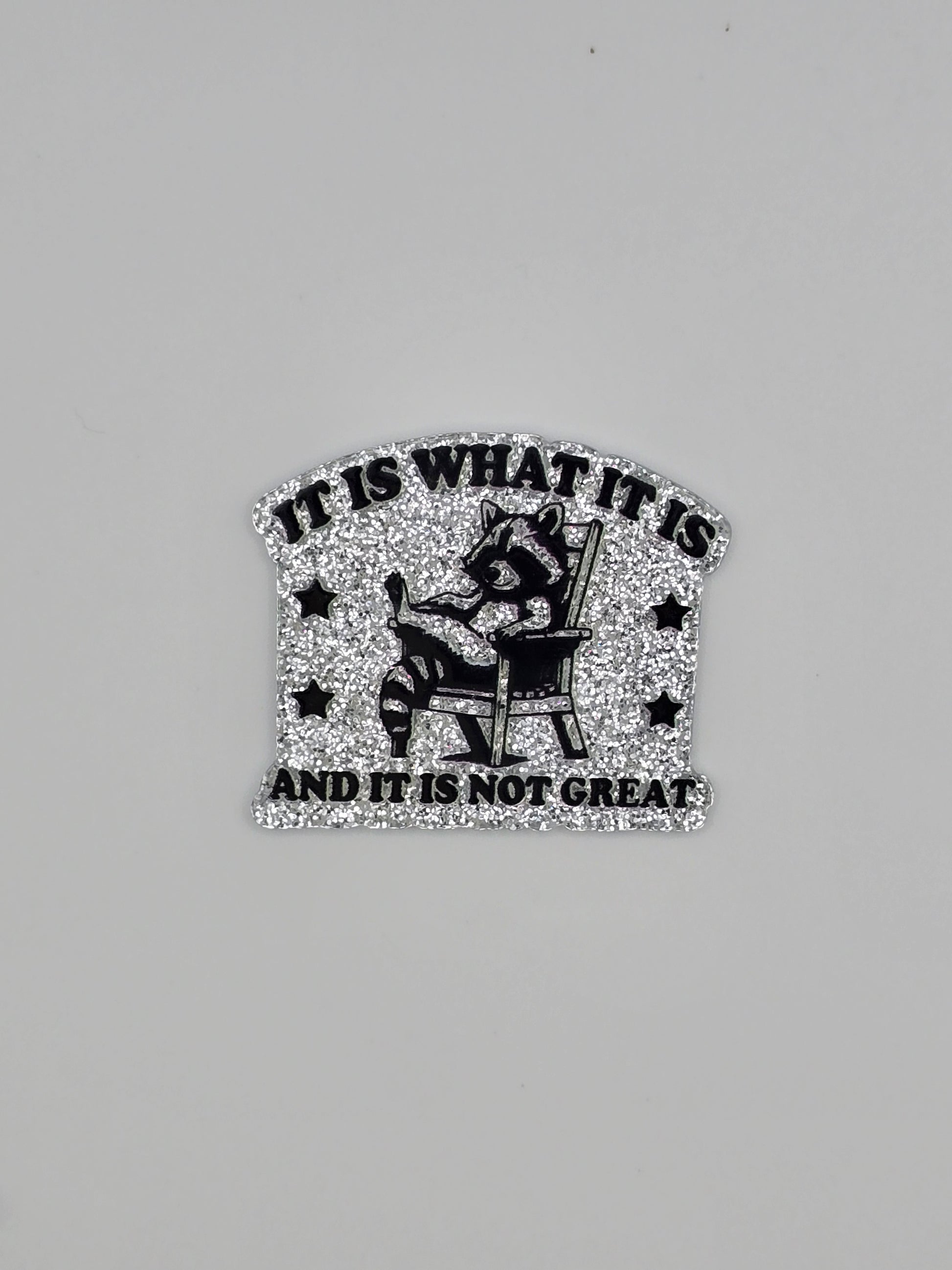 Text It Is What It Is And It Is Not Great on an glitter sliver Acrylic Flatback 