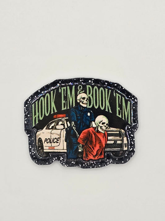 Hook 'Em & Book 'Em