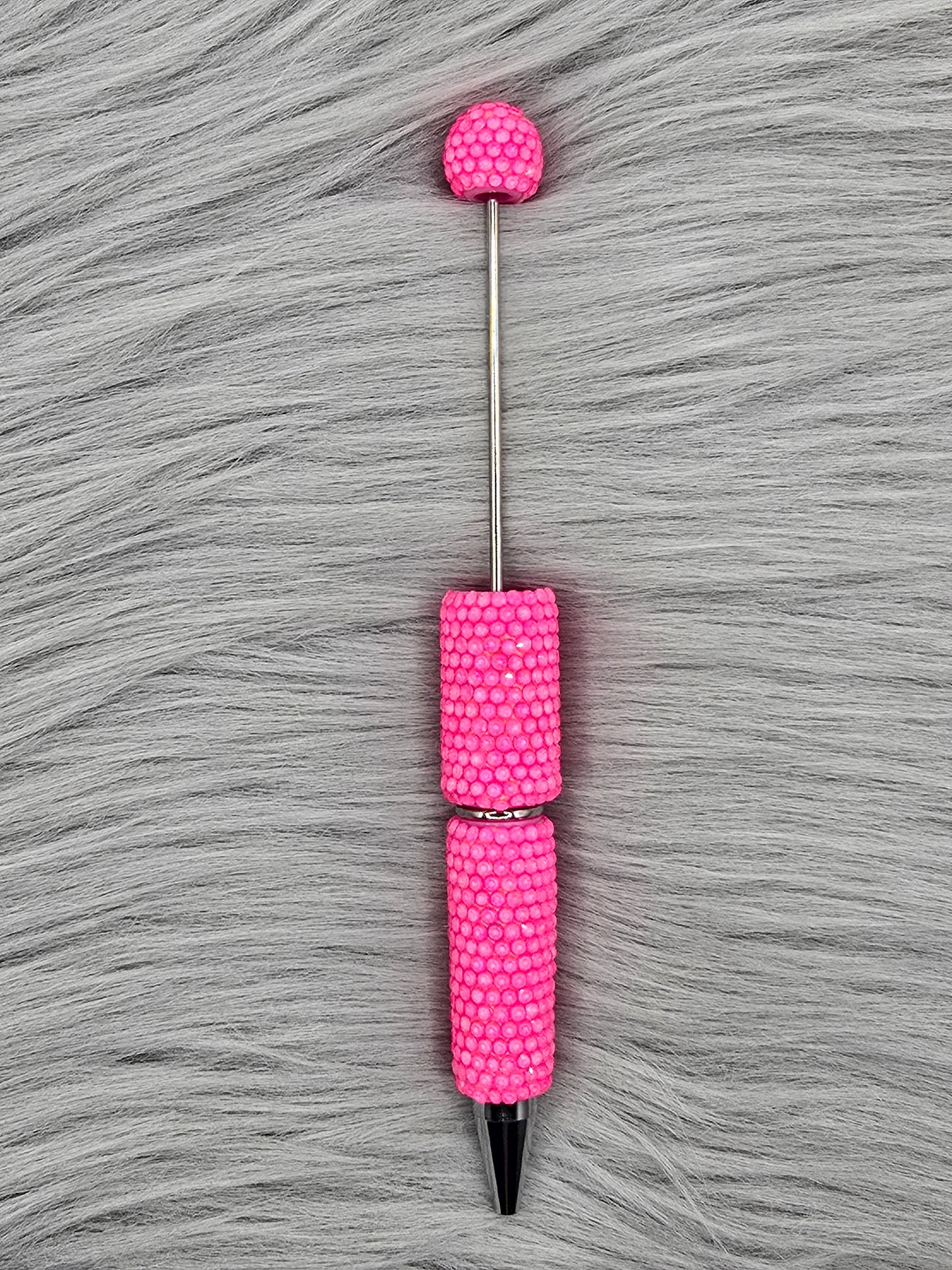 Neon Light Pink beadable pen on gray fur background