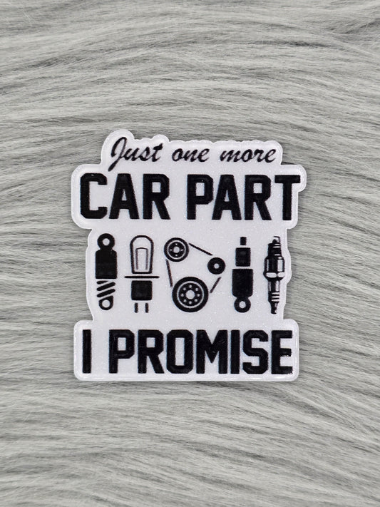 White acrylic flatback with car part illustrations with the words "Just one more car part I promise"