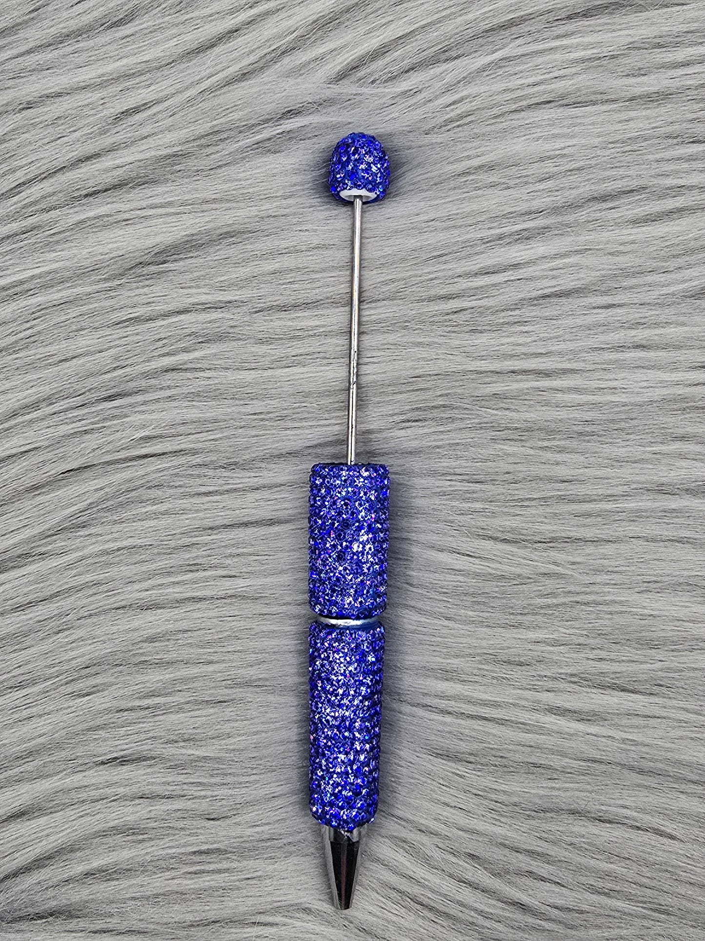Blue Clay Rhinestone Beadable Pen on a gray fur background