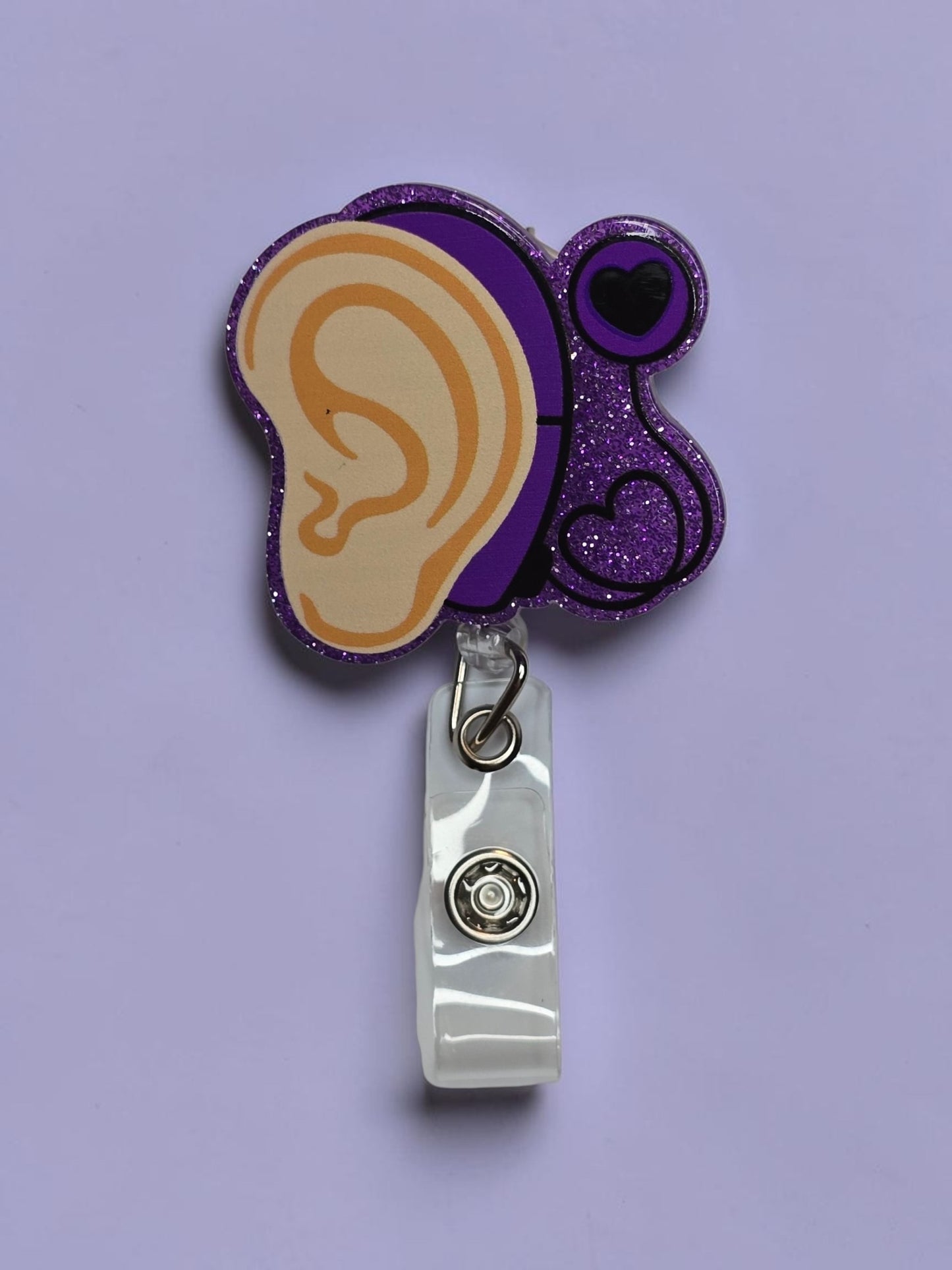 Ear with Hearing Aid Badge Reel